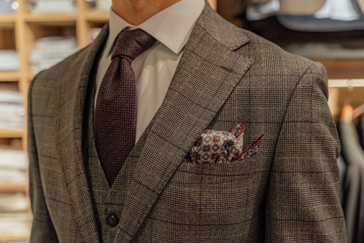 Man in Gray and Black Plaid Suit Jacket